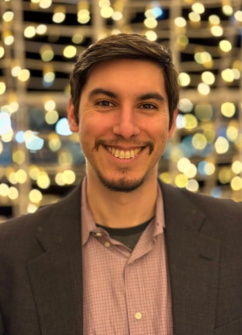 headshot of Alex Kane